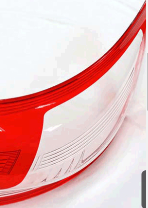 A clear transparent automotive light cover made with injection molding